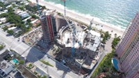 an aerial view of a construction site near the ocean